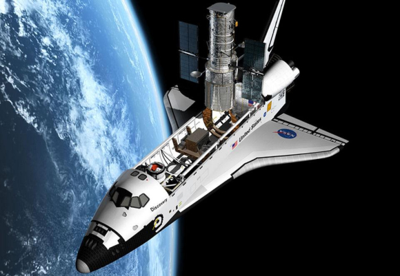 תרומה אדירה לחקר היקום. מעבורת החלל "דיסקאברי" מציבה את טלסקופ האבל במסלולו | הדמיה: NASA