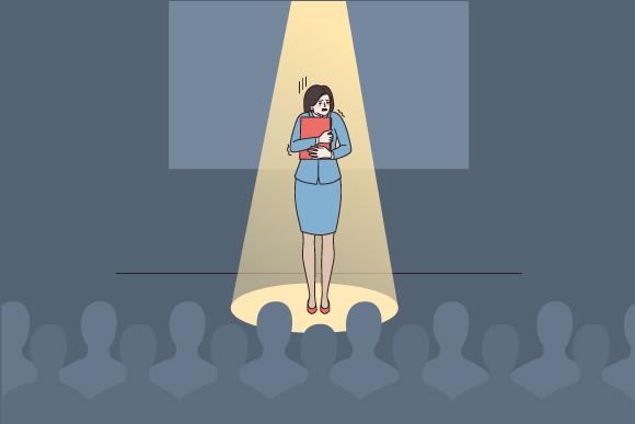 תגובת "הילחם או ברח" מתרחשת לעיתים גם כשהאיום אינו מוחשי אלא מנטלי - כמו האישה בציור, שחווה לחץ כאשר היא מדברת מול קהל | Shutterstock, Drawlab19