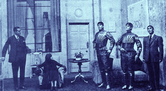 דמויות הרובוטים בצד ימין של הבמה במחזה | מקור: ויקיפדיה, נחלת הכלל