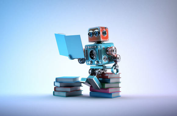 רובוט יושב על ערמת ספרים וקורא | kirill_makarov, Shutterstock