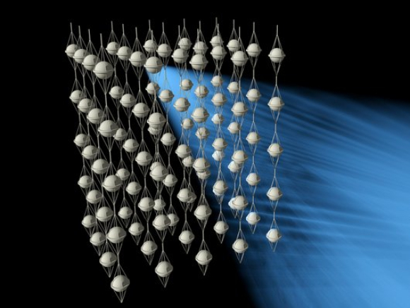 הדמיה של מערך גלאי IceCube בעומק הקרח באנטארקטיקה | מקור: STEVE YUNCK / LOOK AT SCIENCES / SCIENCE PHOTO LIBRARY