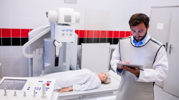 Proper protective gear should be used. A doctor in a lead apron, which protects against X-rays. | Photo: wavebreakmedia, Shutterstock