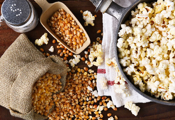 Start with popcorn. Corn kernels and popcorn | Photo: Steve Cukrov, Shutterstock