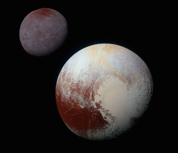 נקודה לזכות פלוטו: יש לו גם ירחים משלו. פלוטו (בחזית) עם ירחו הגדול, כארון | צילום: NASA