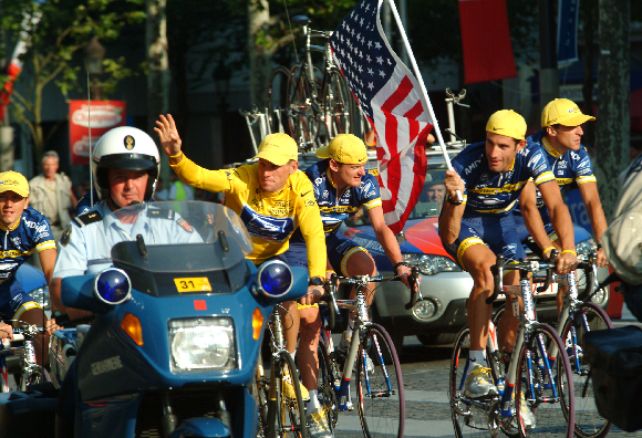 Lance Armstrong (in the Yellow shirt) winning the Tour de France in 2004 | Photo: Marc-Pagani Photography, Shutterstock