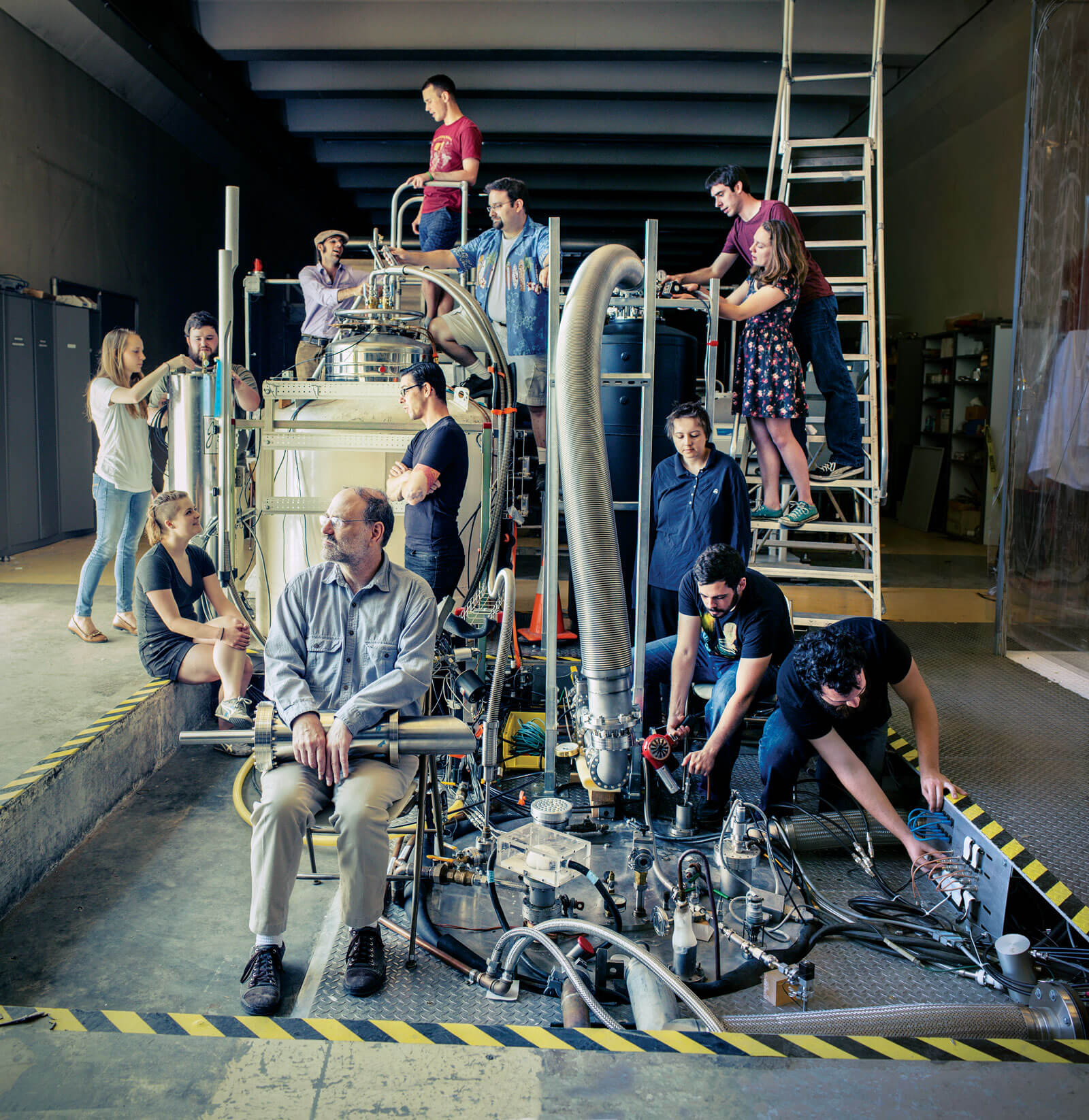 תמונה של מחפשי החלקיקים מאוניברסיטת וושינגטון, סיאטל. קרדיט: טימות'י ארצ'יבלד | Scientific American